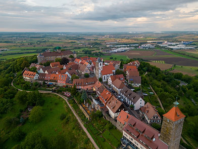 Aerial view of the medieval town of Waldenburg sitting on a hilltop high above the plains