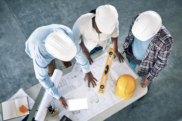 taking-clients-designs-level-shot-group-builders-having-meeting-construction-site.jpg