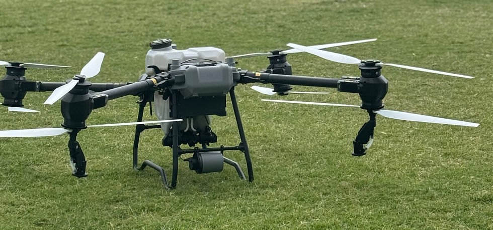 DJI Agras T50 agricultural drone on a grass field