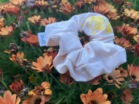 Sand colored scrunchie with intricate embroidery 
