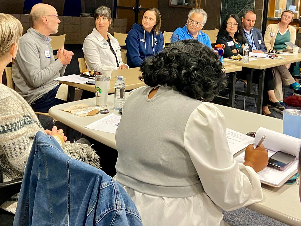 steering committee plans next steps around a table