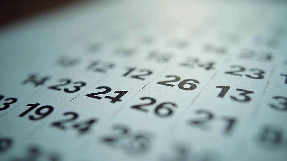 Close-up of a calendar with marked dates