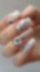 photograph-showing-simple-elegant-white-nail-art.jpg