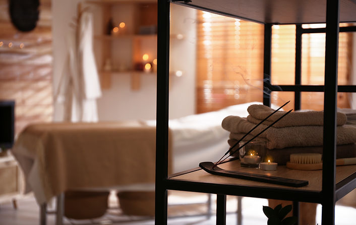 aromatic-incense-sticks-burning-candles-towels-spa-salon-interior-design.jpg