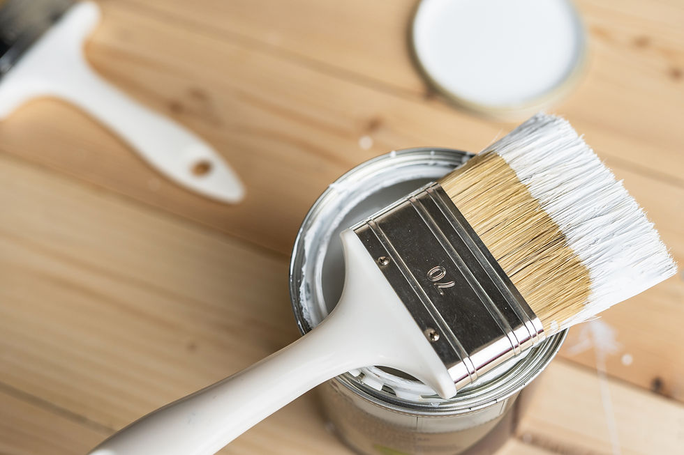 Top view on white paint brush on the opened can on the wooden table or floor painting and 