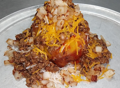 Braised orange bell pepper stuffed w lentil quinoa onion cheese and sriracha.jpg