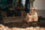 close-up-worker-backhoe-working-construction-site.jpg