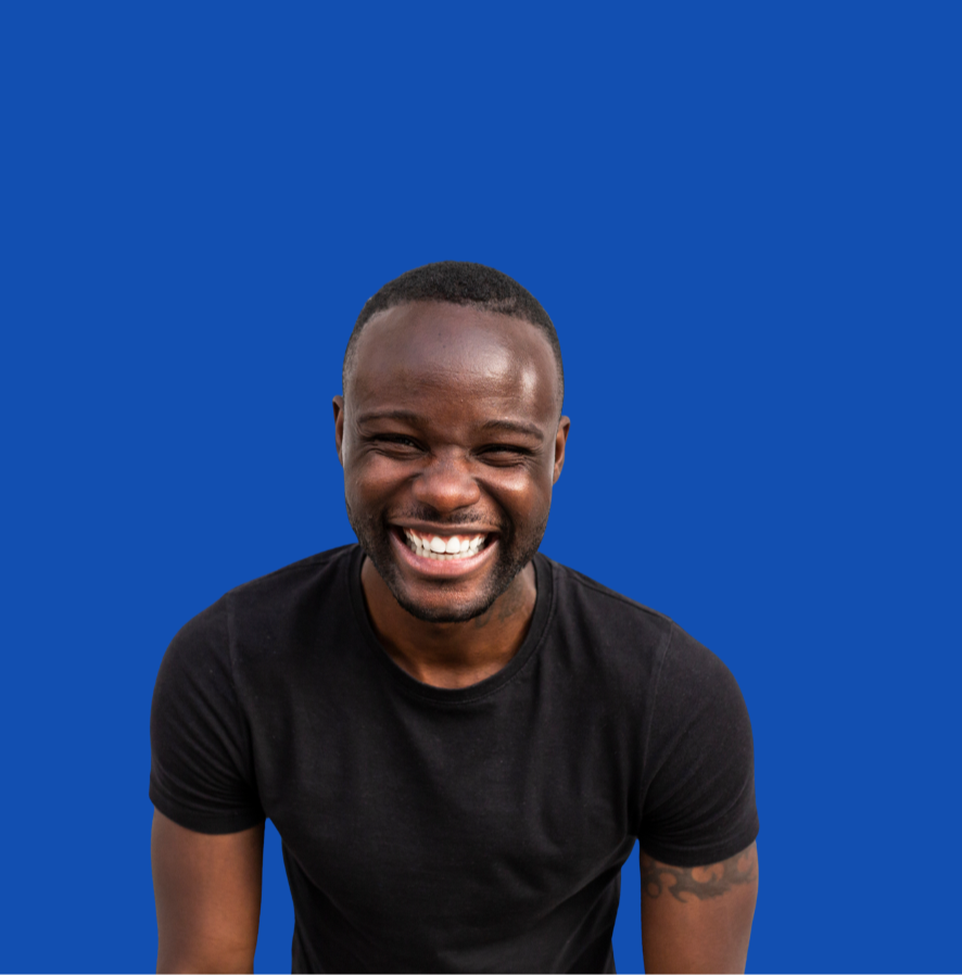 Smiling young man broadly
