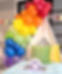 A bright rainbow balloon garland perfect for Birthday parties near me for sleepover teepee setups.