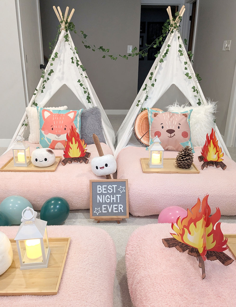 Cozy Camp teepee tents styled with soft pinks and pops of light teal