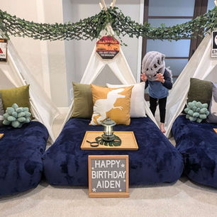 dinosaur sleepover teepee setup