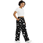 Pantalones negros con lunares blancos