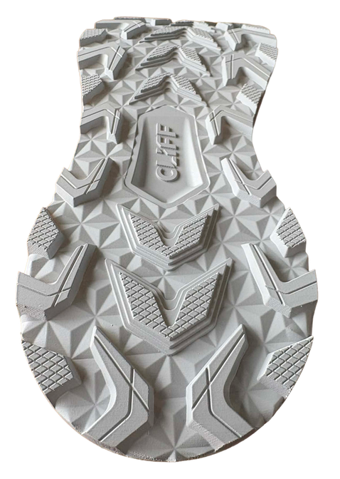 Close-up detail of trail running shoe outsole showing lug geometry and rubber traction pattern for outdoor performance
