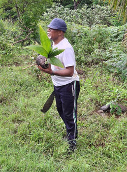 Mr. Sele Tagivuni taking part in the replanting program