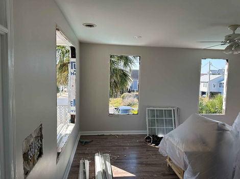 Open Window frames are shown for the installation of new windows.