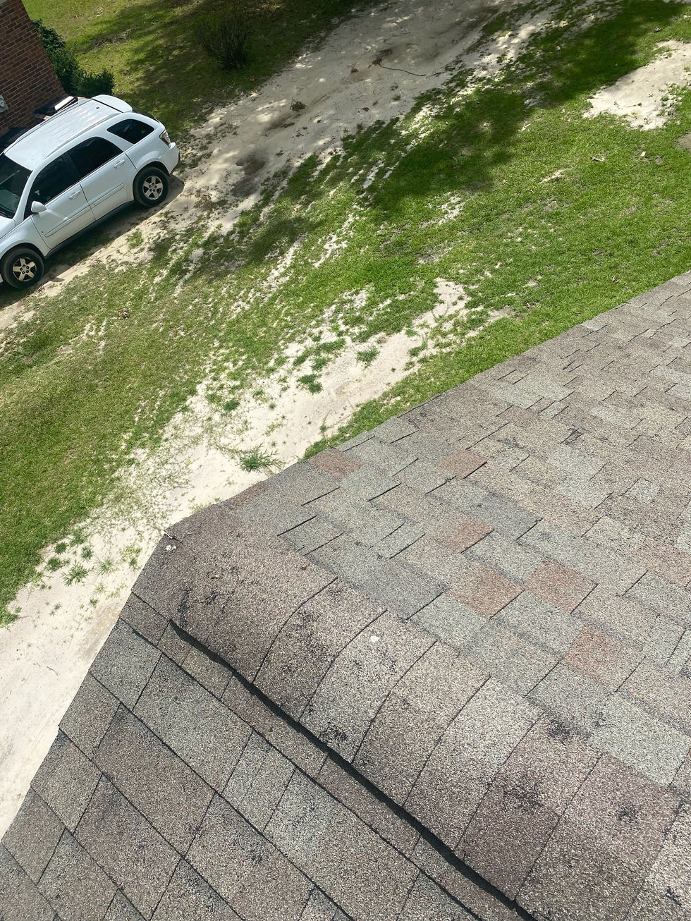 visible hail damage on roof shingles