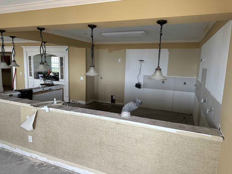 Kitchen gutted before remodel.