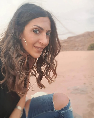 Woman smiling desert background