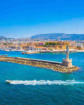 Aerial view of the old harbor and the famous lighthouse of Chania, Crete, Greece.jpg