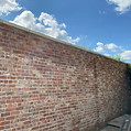 Brickwall with blue sky