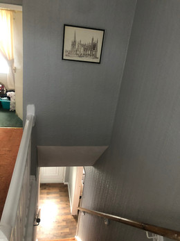 Wallpaper and painted wall