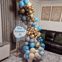 Christening party with decorative balloons and signage from Daisy Chain Ltd
