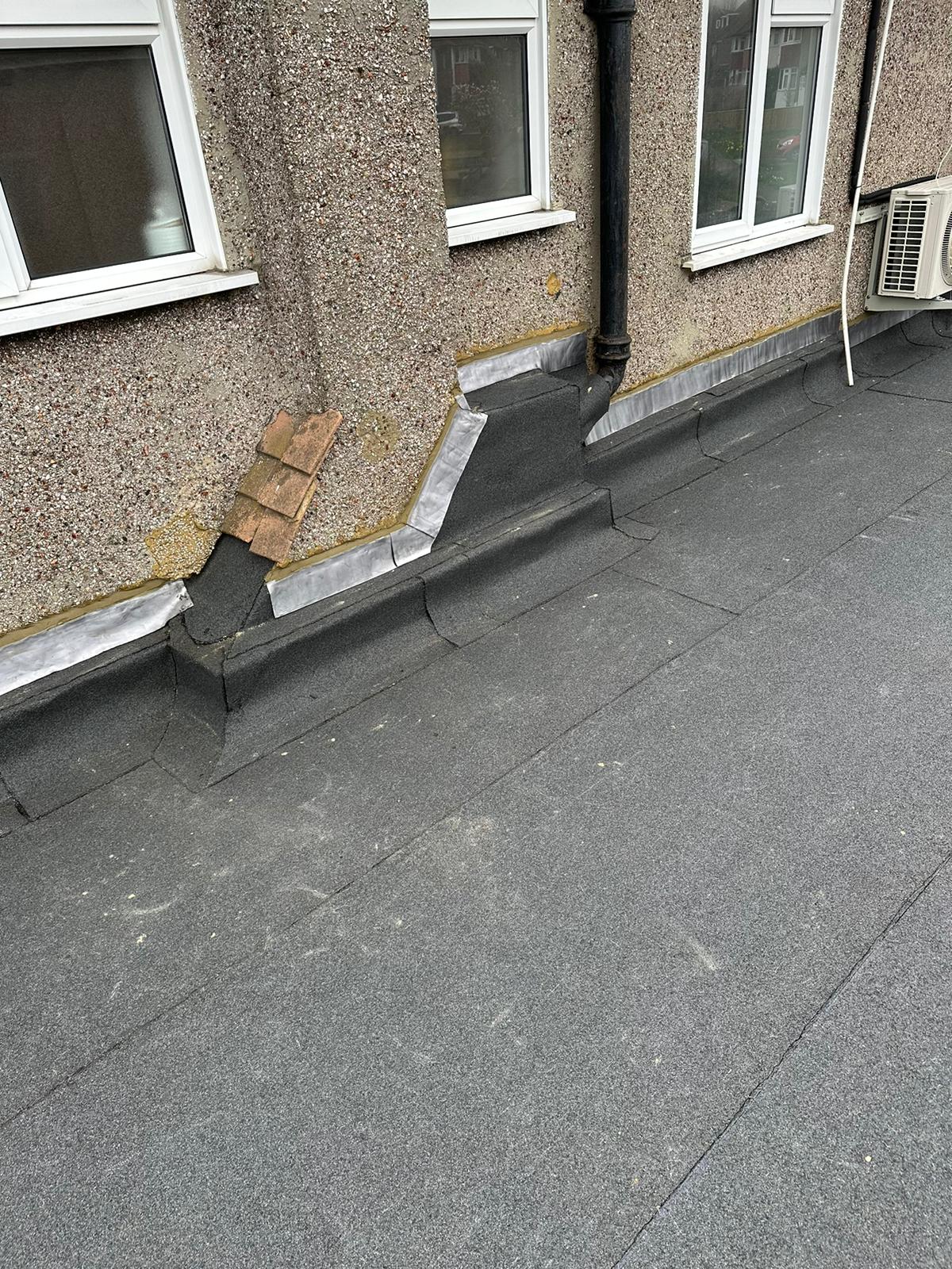 wh-roofing-flat-roof-waterproofing-and-wall-flashing-detail-09.jpg