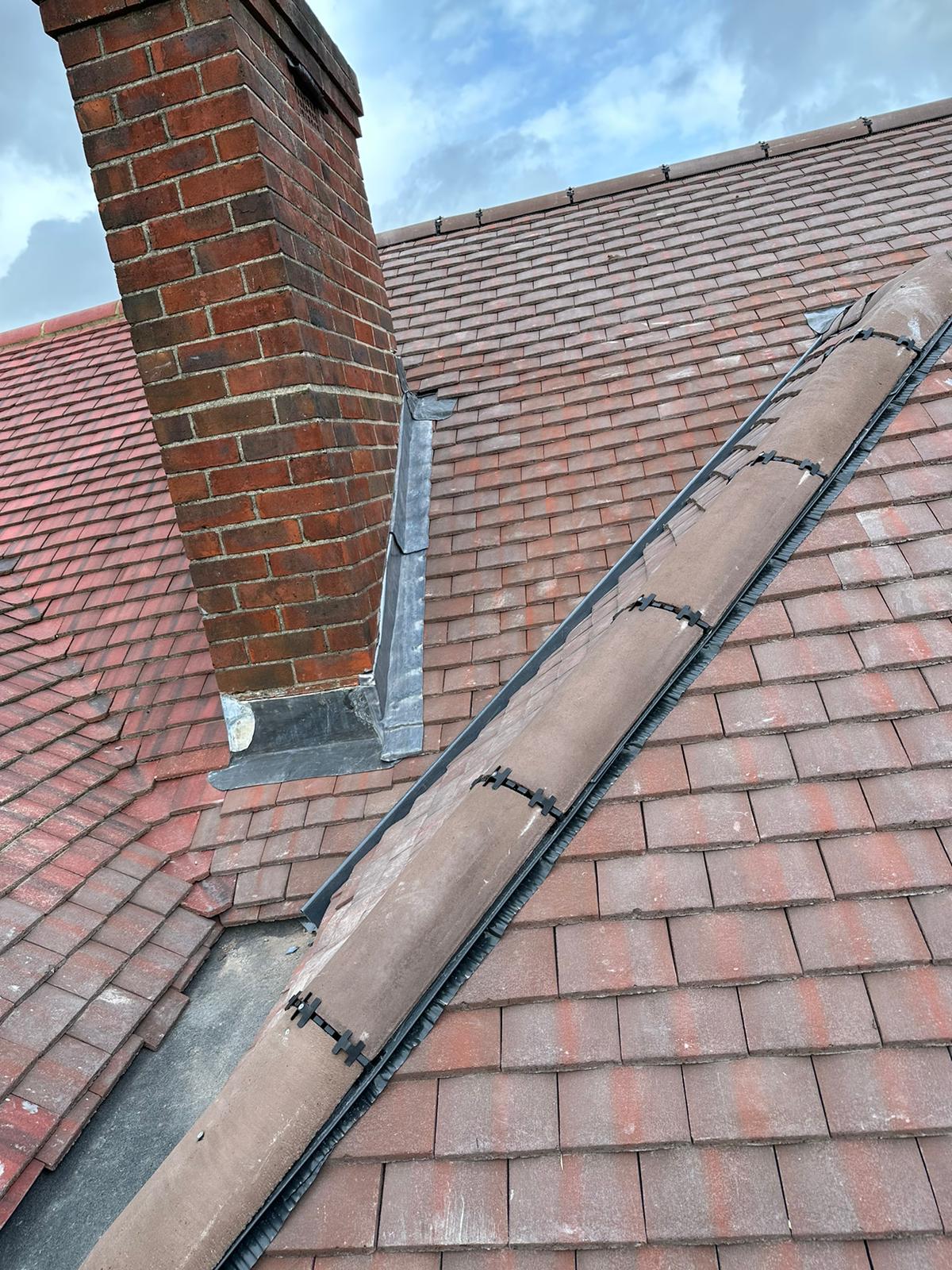 wh-roofing-red-tiled-roof-ridge-and-chimney-flashing-08.jpeg