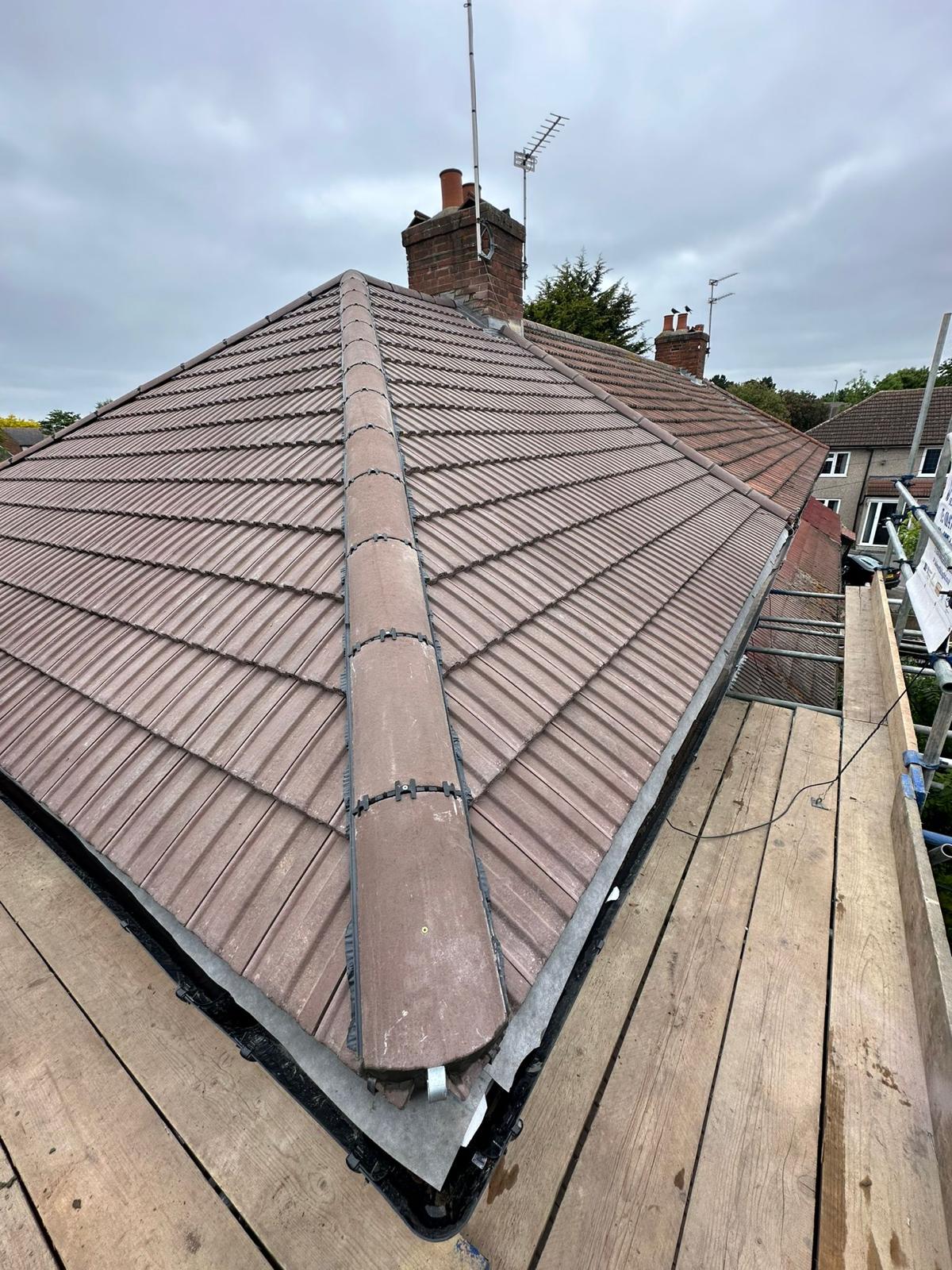 wh-roofing-completed-hipped-tile-roof-with-ridge-and-guttering-21.jpg