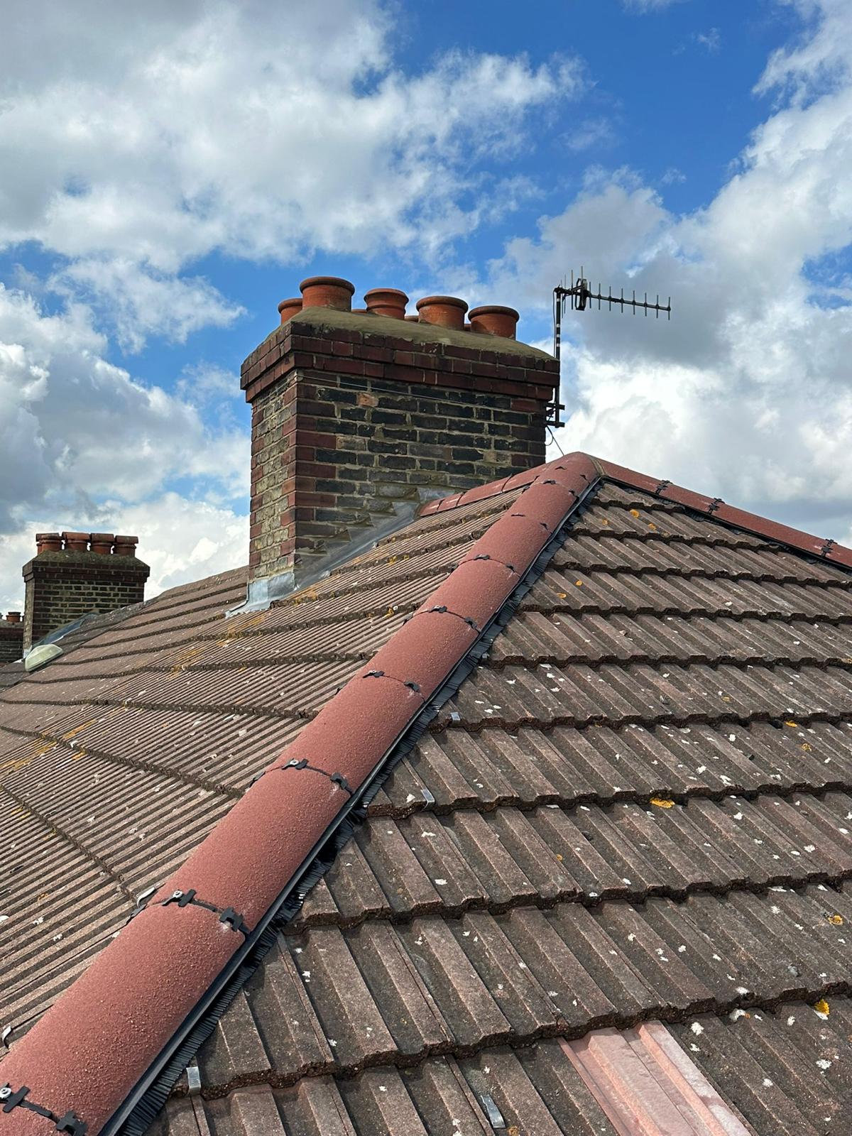 wh-roofing-pitched-roof-ridge-tiles-and-brick-chimney-07.jpg