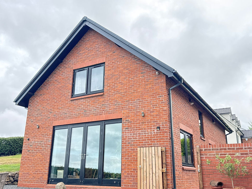 Red bricked house with new fascias and soffits