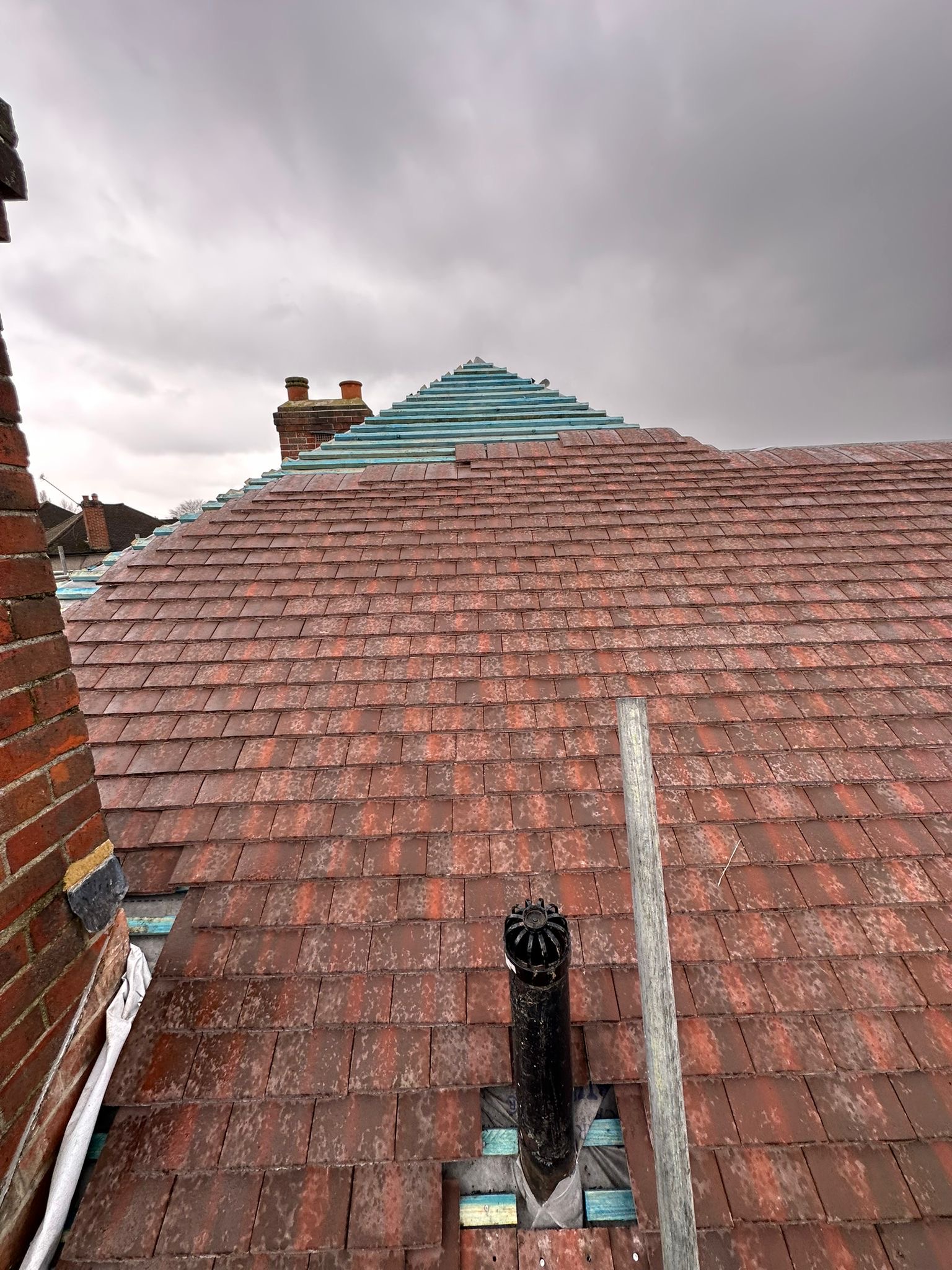 wh-roofing-red-pitched-roof-tiling-view-from-scaffolding-11.jpg