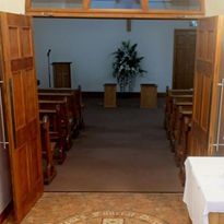 rows of seats inside the funeral service