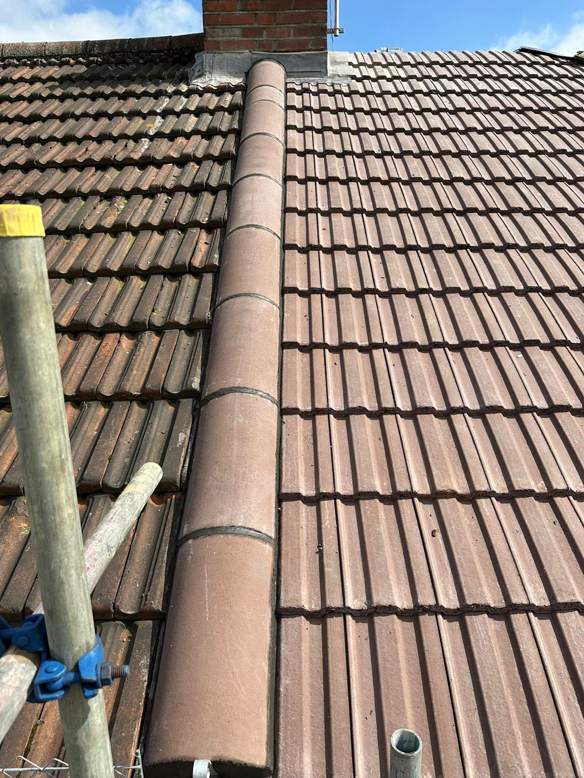 wh-roofing-pitched-roof-ridge-tile-and-chimney-junction-28.jpg