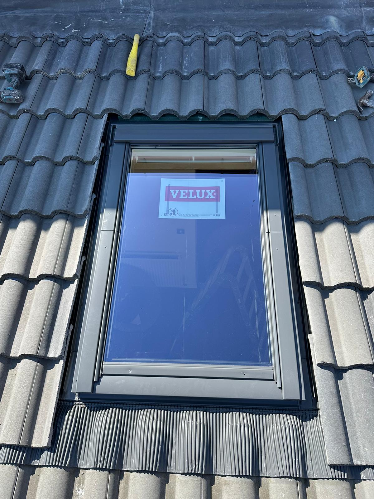 wh-roofing-roof-window-installation-in-grey-interlocking-tiles-17.jpg