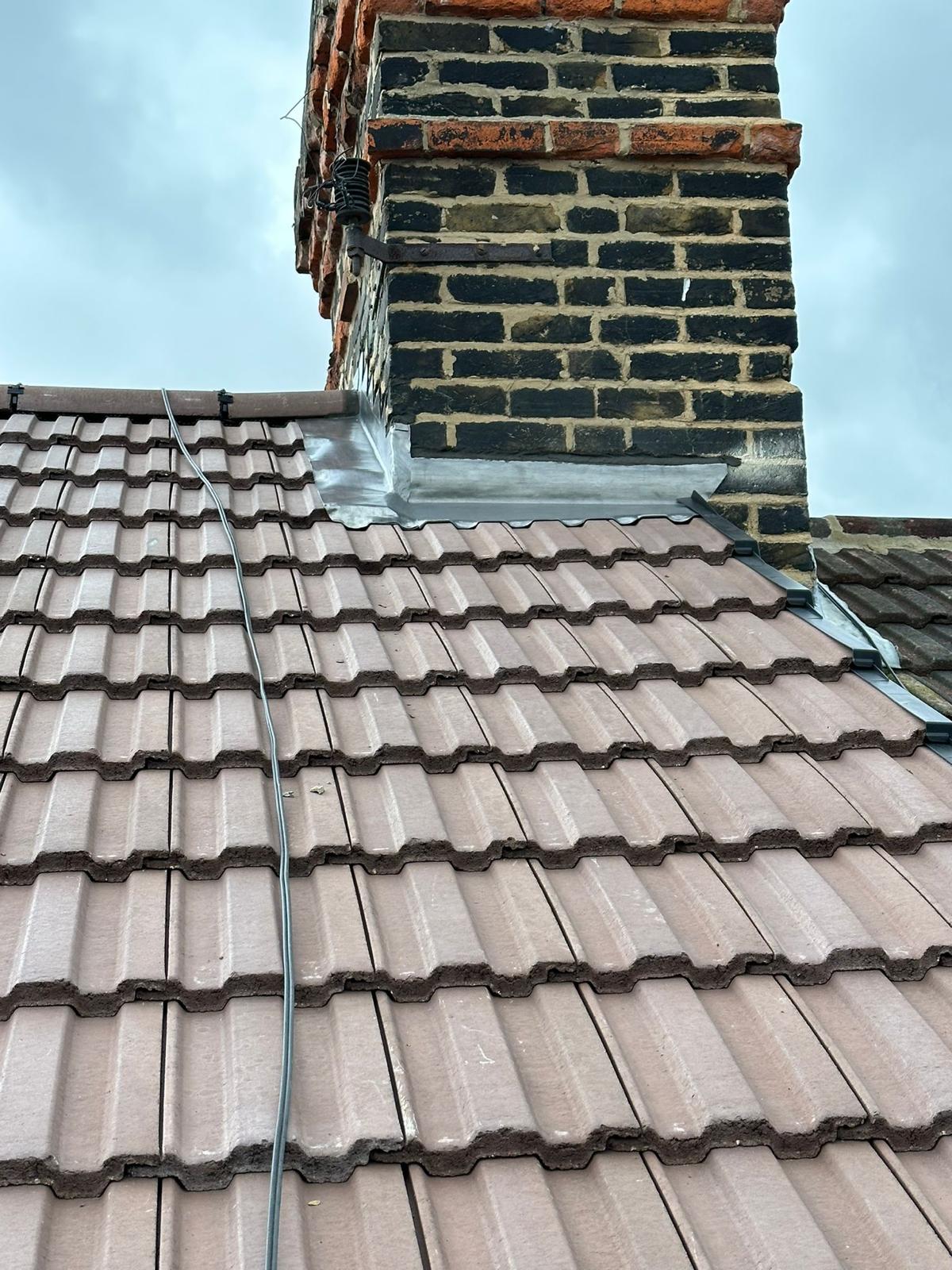 wh-roofing-brick-chimney-flashing-on-pitched-tiled-roof-24.jpg