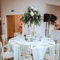 White themed Winter wedding with white flower arrangements