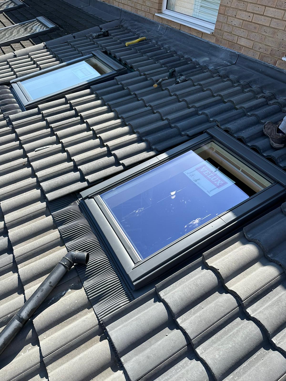 wh-roofing-two-roof-windows-in-grey-tiled-pitched-roof-30.jpg