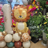 Children's first birthday occasion balloons with a lions and themed balloons with a number one