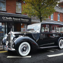 Black polished vintage hearse