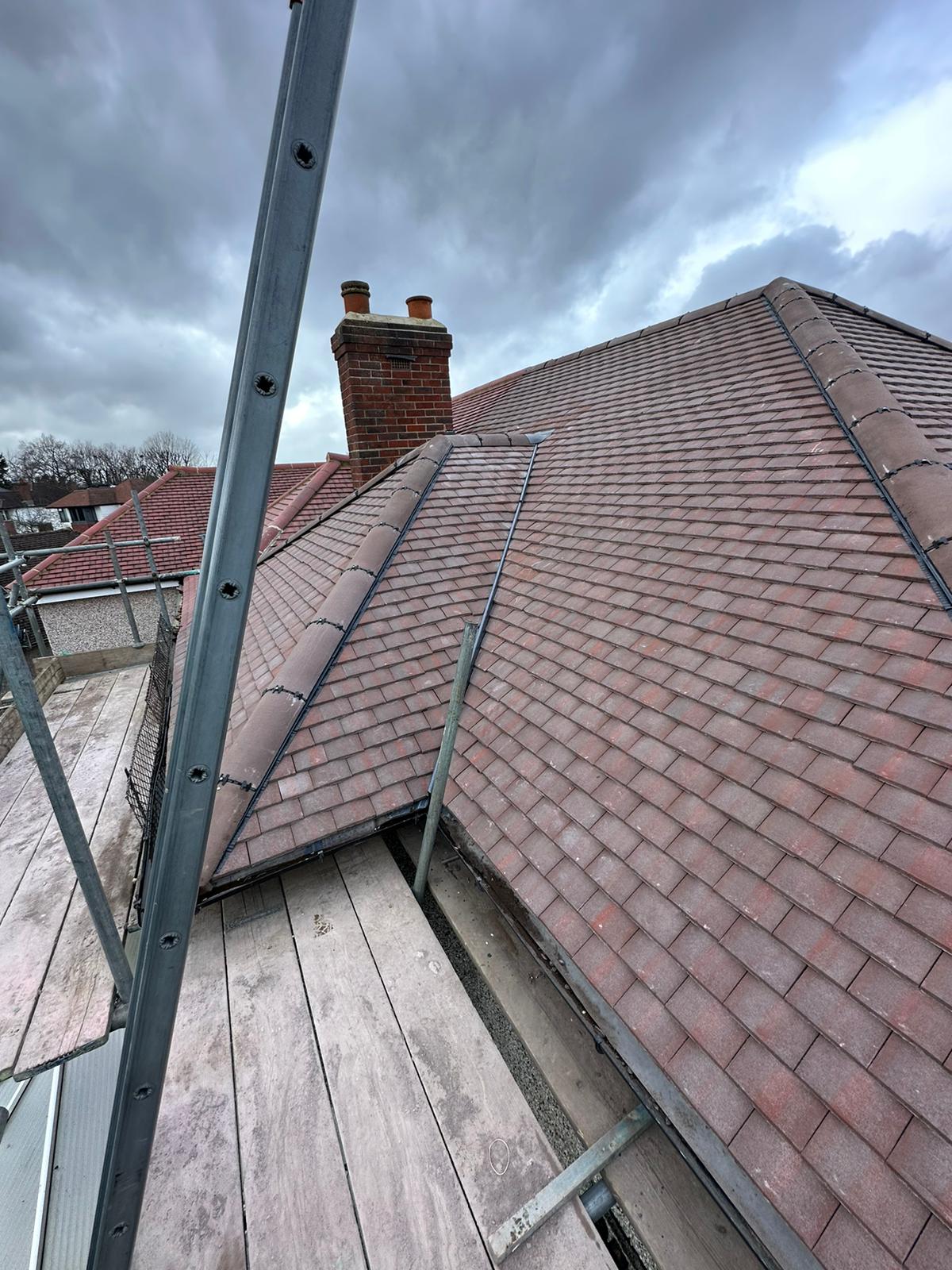 wh-roofing-red-tiled-hip-roof-scaffolding-and-chimney-view-37.jpg