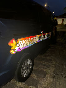Dan's Taxis logo on a cab