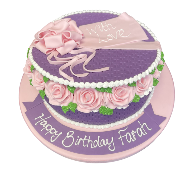 Bespoke cake shaped as a basket filled with ten detailed rose designs, crafted in Solihull, West Midlands.