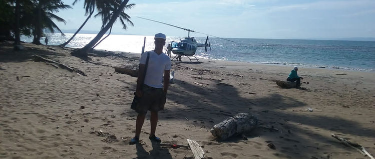 Beachfront scene with helicopter access and tropical coastline at Playa Esmeralda in Miches.