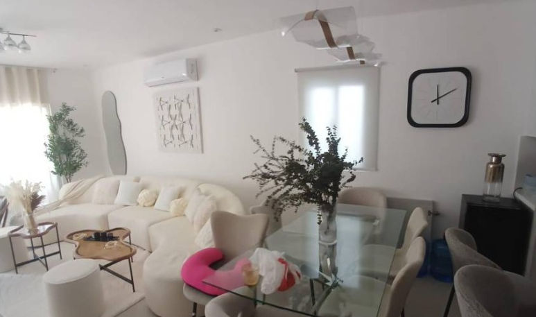 Bright modern living and dining area inside a fully furnished villa in Bayahibe Dominican Republic