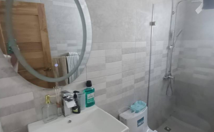 Modern bathroom with walk-in shower in a fully furnished villa in Bayahibe