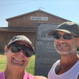 A life-size photo of Marshal McCully stands outside his late 1800s establishment that still stands in Sod House Museum in Aline, Oklahoma.