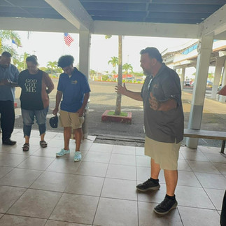 A prayer with the students and families before the trip. 