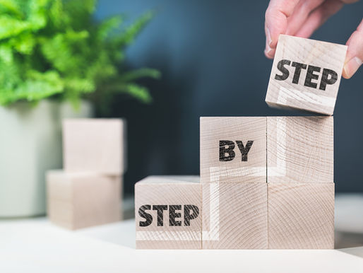 Blocks with the words Step By Step | Corey's Construction