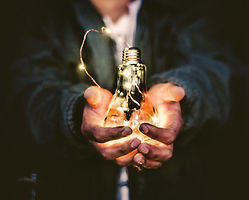 man%20holding%20incandescent%20bulb_edit